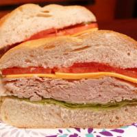 Turkey Melt · Boar's head sliced turkey, melted swiss cheese crispy bacon, lettuce, tomato and your choice...