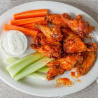 Chicken Wings · Nine pieces. Choice of hot, teriyaki or bbq served with blue cheese, ranch or buffalo.