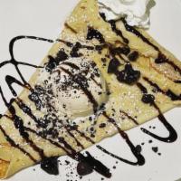 Oreo Yum Crepe · Oreo bits, vanilla ice cream, hot fudge, whipped cream.