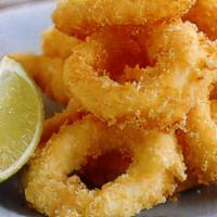 Calamari Rings · Breaded calamari rings deep fried with your choice of tomato sauce, tartar sauce, or chipotl...
