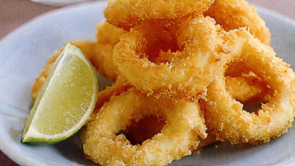 Calamari Rings · Breaded calamari rings deep fried with your choice of tomato sauce, tartar sauce, or chipotle mayo.