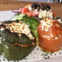 Yemista · Pepper and tomato stuffed with ground beef, rice and Feta cheese.