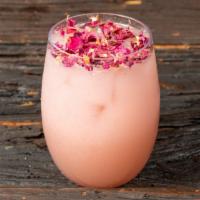Pink Island · Our signature Tea: Raspberry Green Tea with pink pitaya coconut milk tapped with edible rose...