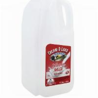 Whole Milk - 1/2 Gallon · A half gallon jug of milk