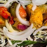 Salmon Tikka · Grilled in tandoor fresh fenugreek leaves