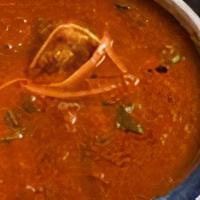 Kori Gassi · Spicy. Mangalorean-style coconut chicken curry.