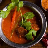 Rogan Josh · Kashmir-style lamb curry, saffron, and yogurt.