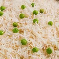 Basmati Rice · Tempered cumin and green peas.