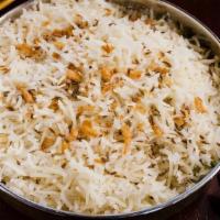 Ghee Chawal · Basmati rice, ghee, bayleaf, cloves and cumin.