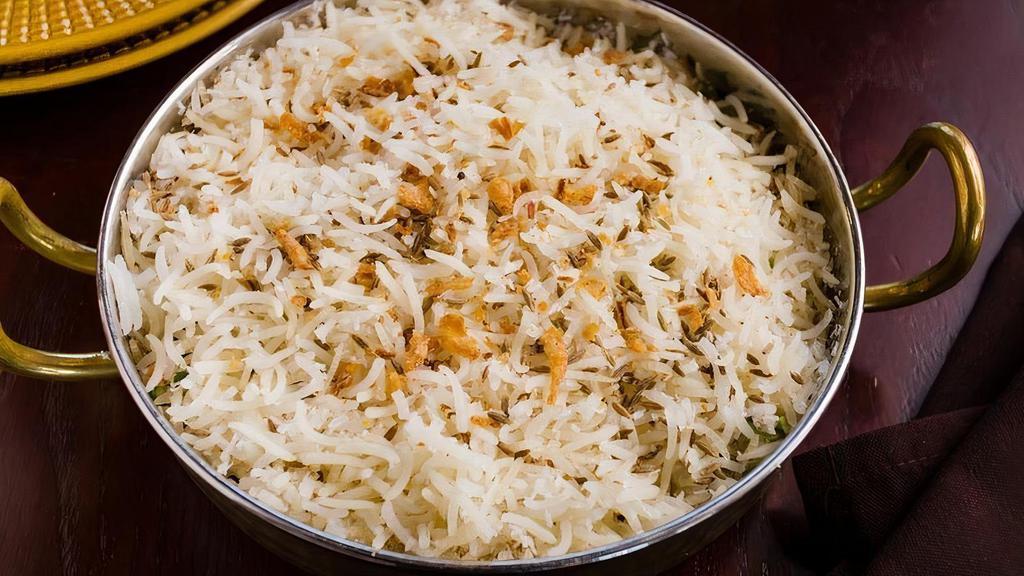 Ghee Chawal · Basmati rice, ghee, bayleaf, cloves and cumin.