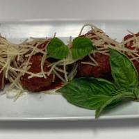 Meatballs · 3 Meatball, topped with a red sauce & shredded parmesan
