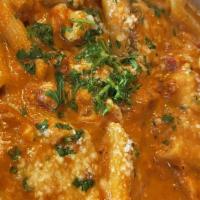 Penne Ala Vodka With Chicken · Served with bread and butter