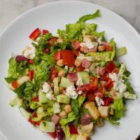 Mediterranean Chopped Salad · Red peppers, cucumbers, tomato, black olives, feta cheese, chickpeas, romaine lettuce, fresh...