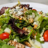 Jonathan'S Salad · Mixed greens, radicchio and endive with crumbled gorgonzola and toasted walnuts.