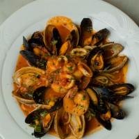 Linguini Alla Pescatori · Jumbo shrimp, calamari, black mussels, little neck clams, sea scallops, tomato basil sauce, ...