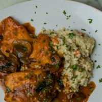 Chicken Marsala · Sauteed scaloppini style in a mushroom marsala demi-glace and served with caramelized carrot...