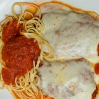 Chicken Parmigiana · Lightly breaded cutlet baked with mozzarella cheese, tomato basil sauce and linguini.