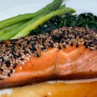 Scottish Salmon · Accompanied by lemon golden potatoes & sautéed spinach