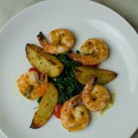 Jumbo Shrimp · Sauteed spinach and lemon roasted red potatoes.