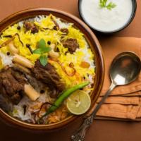 Lamb And Falafel Over Rice · Delicious and juicy marinated lamb and falafel with house seasoning over fresh boiled rice.