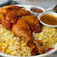 Chicken Over Rice · Marinated and cooked Chicken blended with a mix of spices, and served on a bed of mediterran...