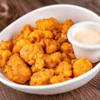 Cauliflower Bites · Lightly Breaded, Fried and served with non-dairy yogurt dip