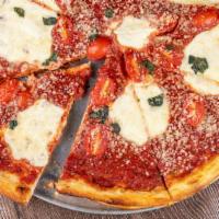 Margherita Pizza · House-made San Marzano tomato sauce, fresh mozzarella, fresh tomato, fresh basil and EVOO.