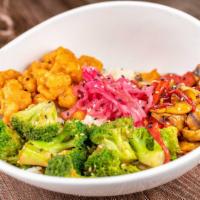 Korean Bbq Bowl · Vegetarian friendly.  BBQ Cauliflower and veggies served over risotto,, and topped with pick...
