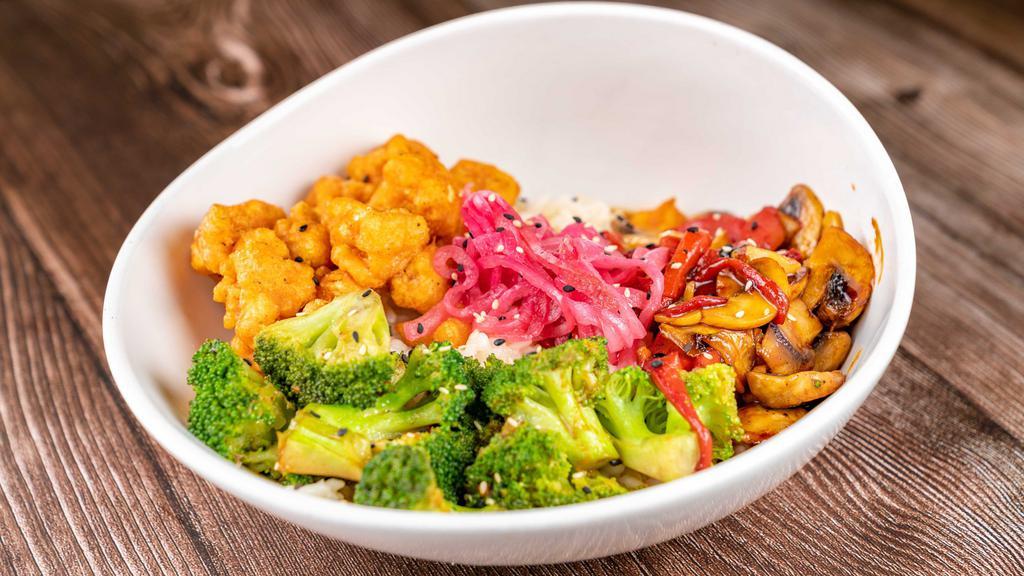 Korean Bbq Bowl · Vegetarian friendly.  BBQ Cauliflower and veggies served over risotto,, and topped with pickled red onions and sesame seeds.