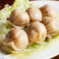 Pork Dumplings (6) · Six pieces. Choose between steamed or fried dumplings.