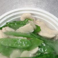 Chicken With Snow Peas · Sauteed Sliced Chicken with Snow Peas in a light sauce.
A Delight.