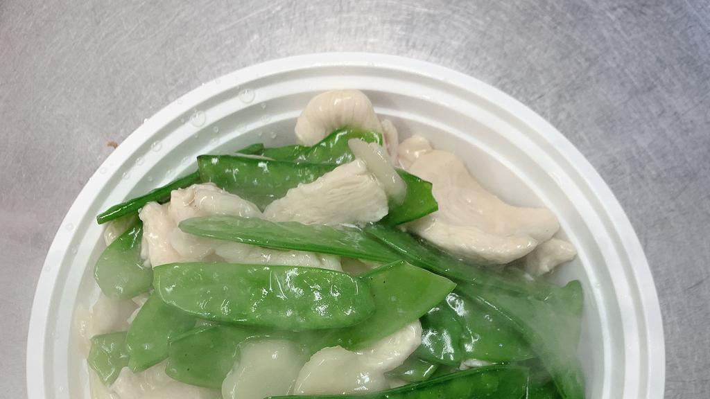 Chicken With Snow Peas · Sauteed Sliced Chicken with Snow Peas in a light sauce.
A Delight.