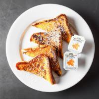 French Toast · 2 slices of our thick bread dipped in fresh eggs, cream and cinnamon. Served with butter and...
