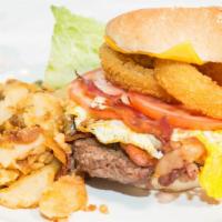 1/2 Lb. Breakfast Burger · With fried egg, bacon, American cheese and home fries. Served with lettuce, tomato, onion ri...