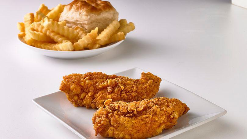 2Pc Chicken Tender Combo Meal · 2 Double Breaded Chicken Tenders, 1 small side of choice, and 1 fresh-baked biscuit.