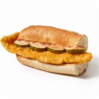 Fish Po'Boy Basket · Fish po'boy (hand breaded fish, our signature sauce, and dill pickle slices on a buttered to...