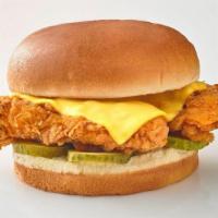 Chicken And Cheese Sandwich · 2 Double Breaded Chicken Tenders with American Cheese on a Buttered Brioche Bun with Dill Pi...