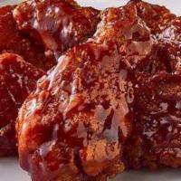 Honey Bbq Bone In Wings · Double Breaded Chicken Wings tossed in our proprietary Honey BBQ Sauce.