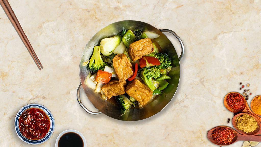Sautéed Tofu & Veggie · Tofu, broccoli carrots, zucchini, lotus, asparagus, sugar-snap peas and cauliflower, sautéed in a rich brown kung-po sauce and baby corn.