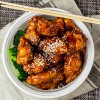 Sesame Chicken · Chunks of white meat chicken, sauteed over a high flame in sesame seeds.