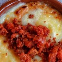 Queso Fundido · Soft corn tortillas, cheese fondue, chorizo