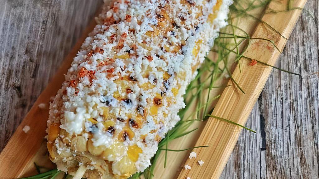 Corn On The Cob · Mayonnaise, tajin, cotija cheese