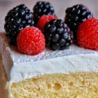 Tres Leches Cake · Marscapone , evaporated, condensed and heavy cream milks. Topped with berries