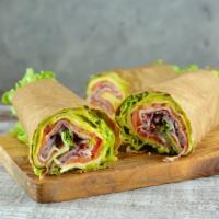 Monte Cristo Wrap · Delicious combination of smoked, sliced turkey, Swiss and cheddar cheese, fresh lettuce and ...