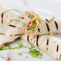 Diet Style Wrap · Soft, fresh mozzarella, fresh lettuce, tomatoes, carrots, cucumbers, and alfalfa sprouts wit...
