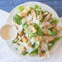 Grilled Chicken Caesar Salad - Large · Crisp romaine lettuce tossed in Caesar dressing topped with chicken.