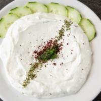 Lebni · Vegan, Dairy-free.

Thick yogurt with walnut, garlic, fresh dill, and herbs.