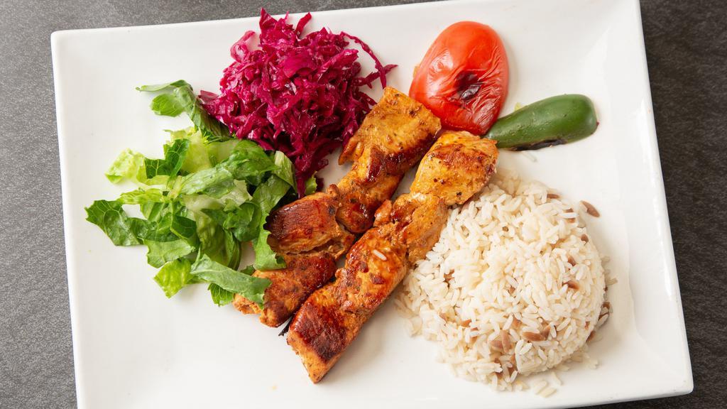 Chicken Shish Kebab · Gluten Free.

Char grilled cubes of chicken breast served with rice, lettuce, and red cabbage.
