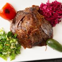 Doner Kebab · Gluten Free.

Ground lamb and beef cooked on a rotating spin then thinly sliced, served with...
