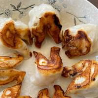 Pan Fried Pork Dumpling · (Pork, Chinese Chives, Carrot)